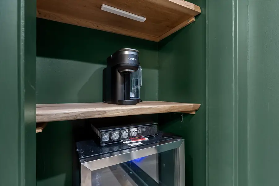 Wet bar nook with coffee maker and beverage refrigerator